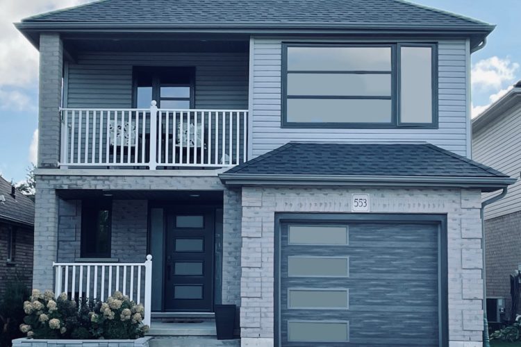 Iron ore windows and door installed by Heritage Renovations in London, Ontario, and manufactured by Gentek.