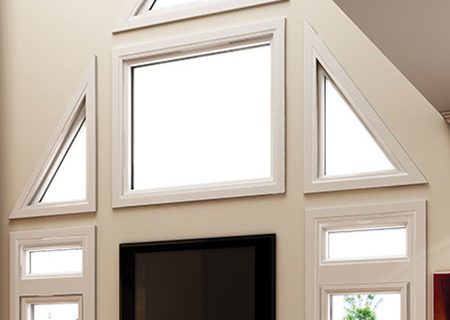 Custom Triangular Shaped Windows Custom triangular shaped windows paired with a picture window by North Star Windows & Doors in London, Ontario.