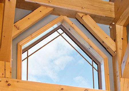 Customer triangular window from North Star Triangular custom shaped window from Heritage Renovations in London, Ontario.